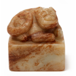 A CARVED JADE SEAL WITH A LION