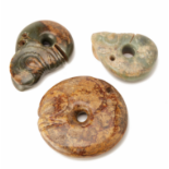 TWO HONGSHAN STYLE JADE DRAGON PENDANTS AND A DISC