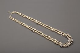 A CHANEL PEARL AND DIAMANTÈ NECKLACE