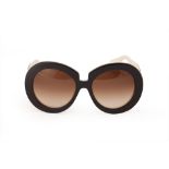 A PAIR OF VALENTINO BLACK SUNGLASSES