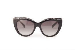 A PAIR OF KATE SPADE BLACK & DIAMANTÉ SUNGLASSES