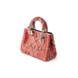 A CHRISTIAN DIOR PINK & BLACK SNAKE SKIN BAG