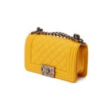 A CHANEL YELLOW LEATHER QUILTED SMALL BOY FLAP