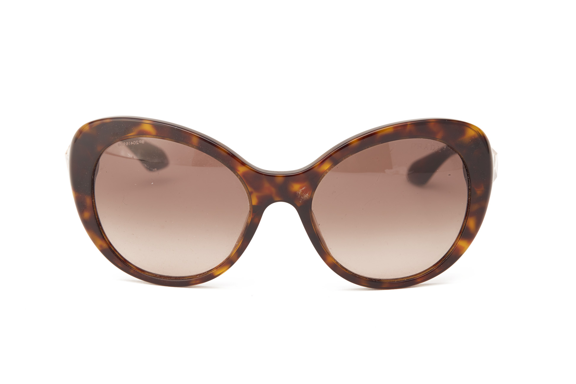 A PAIR OF PRADA TORTOISE SHELL SUNGLASSES