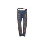 A PAIR OF DOLCE & GABBANA 'AVIO CHIARO' JEANS EU 38