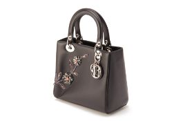 A CHRISTIAN DIOR BLACK MEDIUM LADY DIOR WITH EMBROIDERY