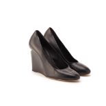 A PAIR OF CHANEL BLACK WEDGE SHOES EU 39