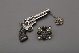 A CHANEL PISTOL BROOCH & DIAMANTÉ PEARL RING