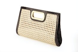 AN ANNE KLEIN CREAM PATENT LEATHER CLUTCH