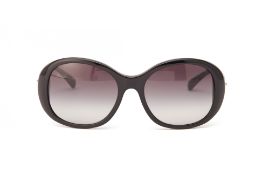 A PAIR OF CHANEL BLACK SUNGLASSES