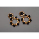 A PAIR OF DOLCE & GABBANA BLACK AND GOLD CLIP ON EARRINGS