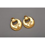 A PAIR OF CHANEL GOLD TONE CC MEDALLION CLIP ON EARRINGS