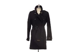 A BURBERRY BLACK MID-LENGTH TRENCH COAT