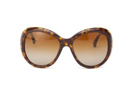 A PAIR OF CHANEL TORTOISE SHELL SUNGLASSES