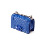 A CHANEL BLUE QUILTED PATENT LEATHER SMALL BOY