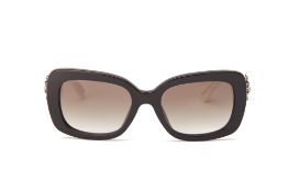 A PAIR OF PRADA BLACK & WHITE SUNGLASSES