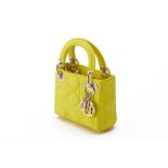A CHRISTIAN DIOR YELLOW QUILTED MICRO LADY DIOR