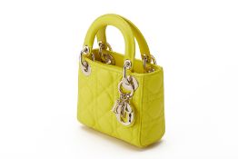 A CHRISTIAN DIOR YELLOW QUILTED MICRO LADY DIOR