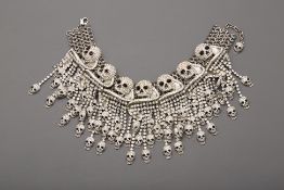 A DIAMANTÉ ENCRUSTED SKULL CHOKER