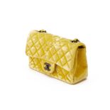 A CHANEL YELLOW VELVET NEW MINI CLASSIC FLAP