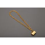 A CHANEL GOLD TONE CLASSIC FLAP NECKLACE