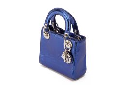 A CHRISTIAN DIOR METALLIC BLUE MINI LADY DIOR HANDBAG