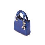 A CHRISTIAN DIOR METALLIC BLUE MINI LADY DIOR HANDBAG