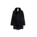 A KATE SPADE FAUX FUR COAT WITH LEATHER GLOVES