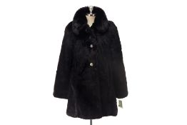 A KATE SPADE FAUX FUR COAT WITH LEATHER GLOVES