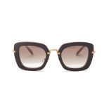 A PAIR OF MIU MIU BLACK SUNGLASSES