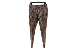 A PAIR OF TALBOTS PATTERNED TROUSERS