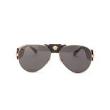 A PAIR OF VERSACE GOLD EMBELLISHED SUNGLASSES