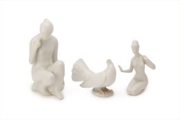 THREE WHITE GLAZED LLADRO AND ROYAL DUX PORCELAIN FIGURES