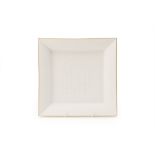 A CARTIER SQUARE BISCUIT PORCELAIN TRINKET DISH