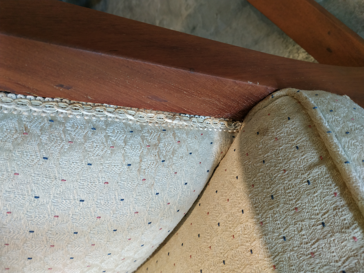 AN UPHOLSTERED TEAK ROCKING CHAIR - Image 6 of 6