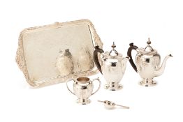 A SILVER PLATED THREE PIECE TEA SERVICE