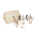 A SILVER PLATED THREE PIECE TEA SERVICE