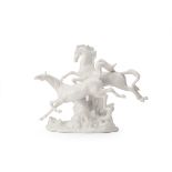 A LLADRO PORCELAIN GROUP OF TWO HORSES GALLOPING