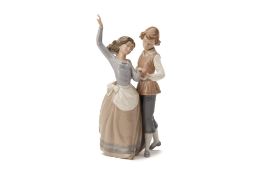 A LLADRO MODEL OF A YOUNG COUPLE DANCING