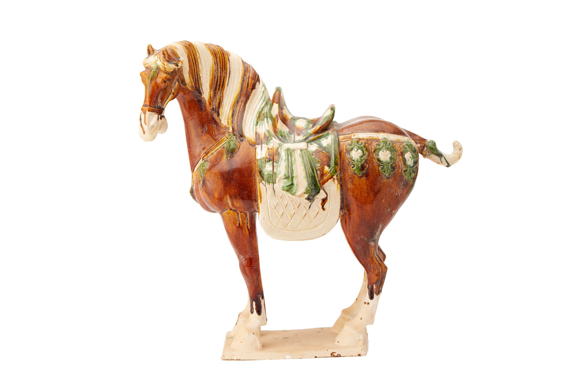 A CHINESE TANG STYLE SANCAI GLAZED MODEL OF A HORSE