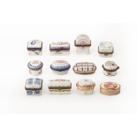 A GROUP OF TWELVE PORCELAIN PILL BOXES