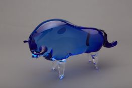 A BLUE GLASS MURANO BULL SCULPTURE