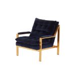 A CONTEMPORARY BLUE VELVET CHAIR