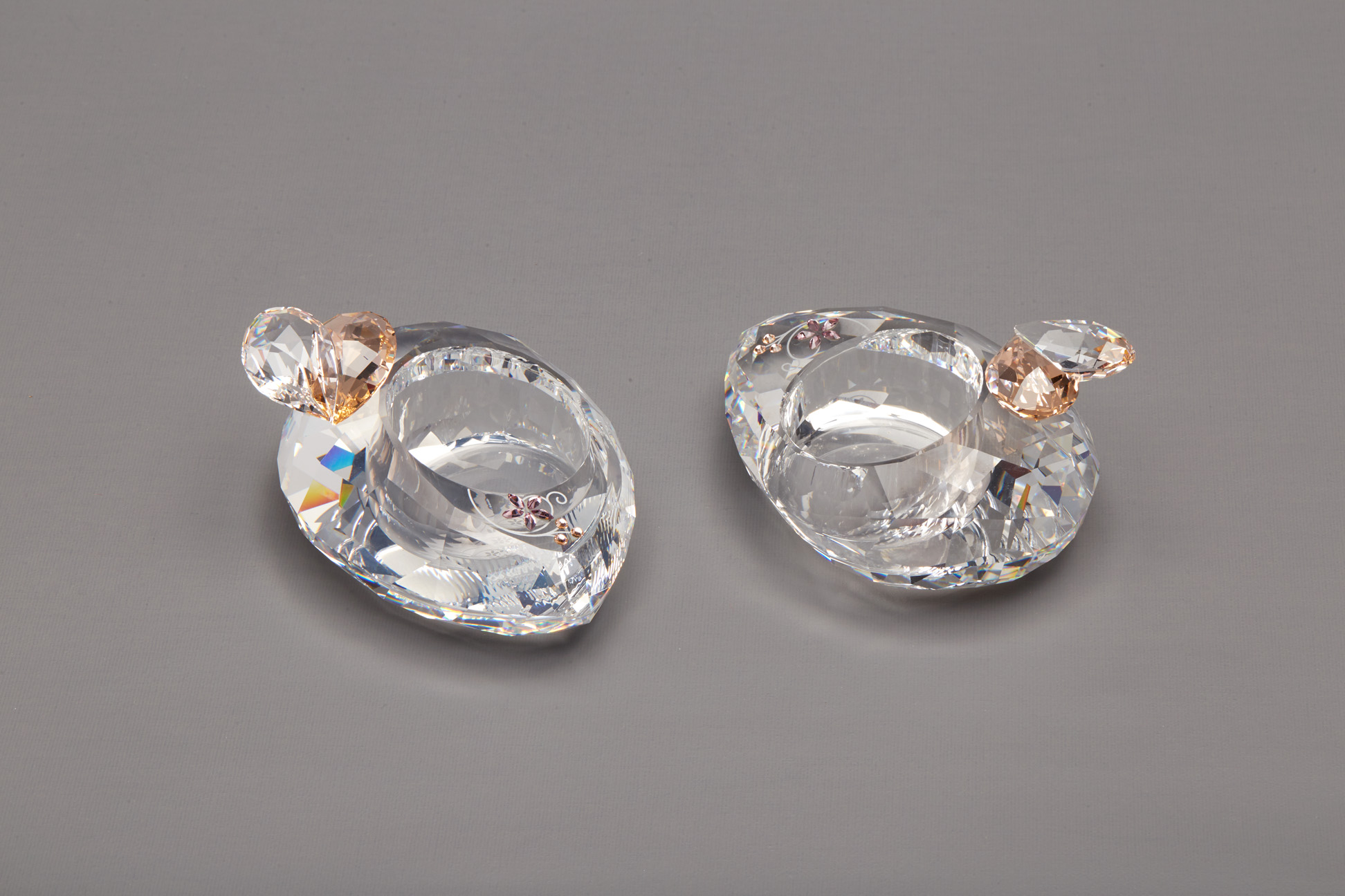 TWO SWAROVSKI CRYSTAL TEA LIGHT HOLDERS