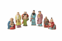 A GROUP OF SEVEN CHINESE POLYCHROME FIGURES