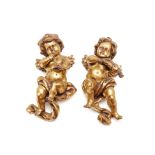 TWO GILT PUTTI