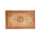 A PERSIAN DESIGN BEIGE & RED SILK CARPET