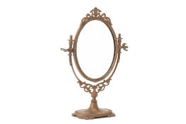 AN OVAL GILT METAL SWING DRESSING TABLE MIRROR