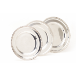 A SET OF THREE GRADUATED SILVER PLATED CIRCULAR TRAYS
