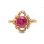 A GOLD RUBY AND DIAMOND RING